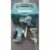 LOT MAKITA SCIE SAUTEUSE, PERFORATEUR, VISSEUSE, BATTERIE, CHARGEUR, BOITE